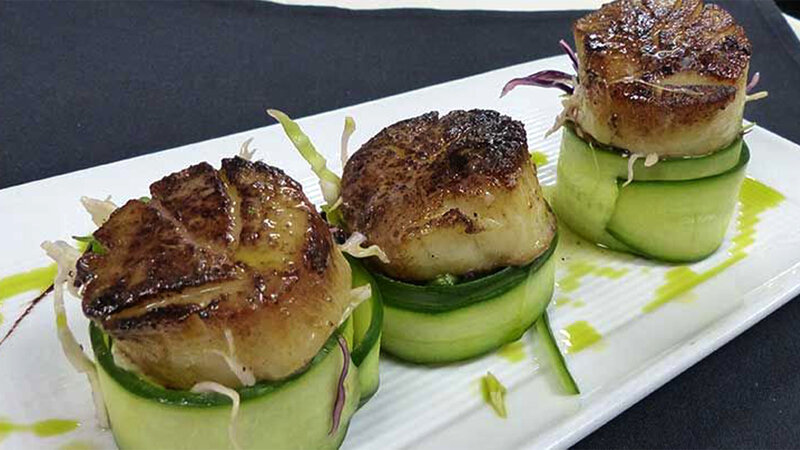 Pan seared glazed scallops appetzier wrapped in cucumber